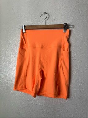PARAGON Neon Orange High-Waist Bike Shorts with Side Pockets